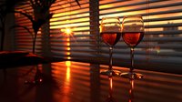 Two glasses of red wine on table with dramatic sunset light streaming through window blinds creating romantic ambiance and shadow patterns.