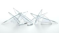 Geometric glass star sculptures with sharp angular points arranged in group on white surface, suitable for modern home decor and interior design projects.
