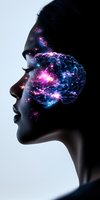 Profile silhouette with cosmic brain visualization showing glowing neural networks, stars and galaxy effects in pink and blue colors against dark background.