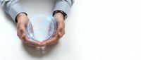 Businessman holding glowing crystal sphere with digital network connections, representing future technology, innovation, and business vision concepts.