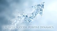 Dynamic water splash forming upward arrow shape symbolizing business growth and success against cloudy sky background for corporate presentations.