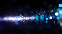 Digital sound wave visualization with glowing blue particles and bokeh effects on dark background, futuristic audio spectrum analyzer display.