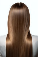 Straight long brown hair from back view showing smooth, glossy texture and healthy shine against white background, demonstrating professional hair care results.