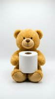 Cute brown teddy bear holding white toilet paper roll on clean background for bathroom decor and hygiene concepts.