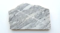 Gray marble stone sample with natural veining patterns isolated on white background for geology education and material identification purposes.