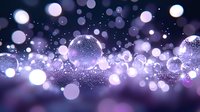 Glowing purple and white bokeh lights creating magical atmosphere with sparkles and blurred circles floating in dark space for festive background.
