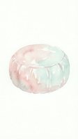 Watercolor painted round cushion or pouf in soft pink and mint green tones, isolated on white background for design projects, home decor, and interior styling applications.