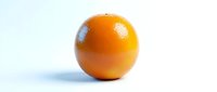 Single ripe orange fruit with glossy skin and water droplets on white background, suitable for food, nutrition, and healthy lifestyle marketing materials.