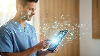Male healthcare professional using digital tablet with glowing network connections in modern medical environment for telemedicine and digital health solutions.
