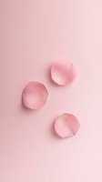 Three pink rose quartz crystals arranged on soft pink background for wellness spa meditation healing energy spiritual practices and mindful living concepts.