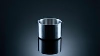 Empty stainless steel cylinder isolated on dark background, suitable for product mockups, industrial design, and commercial applications.