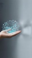 Hand holding glowing digital sphere with interconnected technology icons including graphs, gears, and wireless symbols representing global business innovation and data connectivity.
