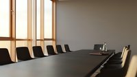 Modern conference room with long dark table, black chairs, and wooden-framed windows. Corporate meeting space for business presentations and negotiations.
