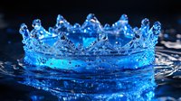 Crown-shaped water splash with bright blue illumination creating magical effect on dark background, frozen moment of liquid dynamics and light reflection.