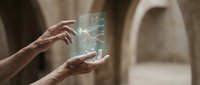 Hands interacting with futuristic holographic interface displaying glowing digital elements and data visualization in modern technology concept.