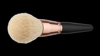 Makeup powder brush with rose gold ferrule and black handle, isolated on transparent background. Great for beauty clipart, stickers, t-shirt design, and print on demand.