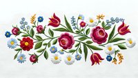 Colorful floral embroidery border with roses, daisies and tulips on white fabric. Traditional needlework design for textile decoration and crafts.