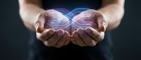 Hands holding glowing infinity symbol with digital light waves, representing technology, innovation, and limitless potential for business and science concepts.