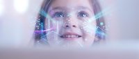 Young girl with digital technology overlay and futuristic interface elements representing artificial intelligence and innovation in education.