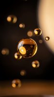 Golden transparent spheres floating in warm ambient light with soft bokeh effects creating dreamy atmospheric background for luxury design projects.
