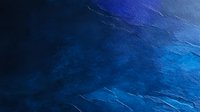 Dark blue ocean waves with rippling water surface texture creating an abstract pattern in deep indigo and cerulean tones, suitable for marine and nature backgrounds.