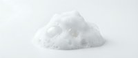 Pile of white granulated salt isolated on white background, ready for food packaging, culinary, seasoning, and kitchen design projects.