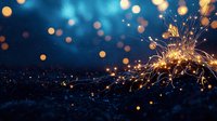 Glowing sparkler emitting bright golden sparks against dark blue background with magical bokeh lights, creating festive holiday atmosphere for celebration designs.