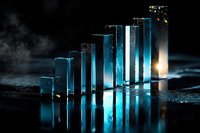 Glowing blue glass blocks arranged in ascending order on reflective dark surface with dramatic lighting and atmospheric smoke effects create modern composition.