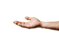 Male Caucasian hand with open palm in welcoming or giving gesture isolated on white background, showing empty space for product placement.