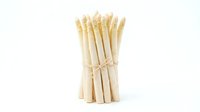 White asparagus bunch tied with twine isolated on white background, ready for culinary design, food packaging, restaurant menus, and cooking websites.