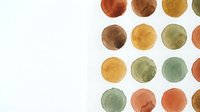 Watercolor circles in warm autumn colors including orange, brown, yellow and green tones arranged in rows on white background for creative projects.