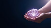 Hands holding glowing purple lotus flower with ethereal light effect against dark background, representing spirituality, healing, wellness, meditation, and energy for wellness industry marketing.