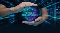 Hands protecting glowing trust framework hologram with network connections in futuristic digital technology environment for cybersecurity and data protection concepts.