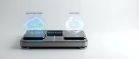 Modern dual wireless charging station with holographic interface displaying algorithm power and user trust metrics for smart device technology.