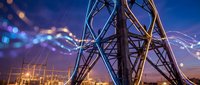 Industrial power transmission towers with glowing electrical lines against twilight sky creating dynamic energy infrastructure scene.