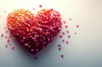 Heart shape formed by small pink and coral paper hearts scattered on light background, creating romantic gradient effect from center to edges. Perfect for Valentine's Day designs.