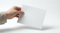 Hand holding blank white envelope on clean background for business correspondence and mailing purposes.