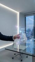 Businessman touching holographic compliance interface in modern office with digital regulations and policy management system for corporate governance.