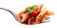 Penne pasta with tomato sauce and fresh basil on a fork, isolated on white background for food photography and menu design.