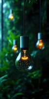 Glowing light bulbs with magical sparkles hanging in garden at dusk, green foliage background creates dreamy atmosphere for outdoor decoration.