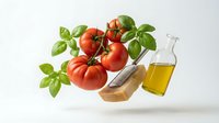Fresh red tomatoes with basil leaves and olive oil bottle floating on white background, perfect for cooking and culinary design projects.