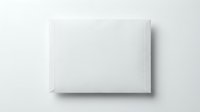 White blank envelope mockup on light background, top view flat lay, for branding, mail, and stationery design presentations.