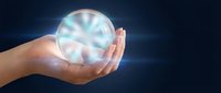 Hands holding glowing crystal ball with radiant light beams on dark background for fortune telling, magic, spirituality and mystical energy concepts.