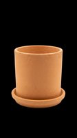 Terracotta plant pot with matching saucer isolated on transparent background, ready for design use on t-shirts, stickers, clipart, and print-on-demand products.