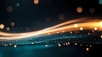 Glowing orange light waves flow through scattered blue particles against dark background with bokeh effect creating magical atmosphere.