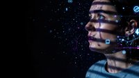 Young African American man with digital network connections and glowing icons projected on face against starry space background for technology concepts.