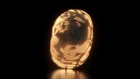 Glowing golden spiral fingerprint pattern illuminated against dark background with light reflection on surface, security and identity concept.
