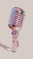 Holographic vintage microphone with iridescent pink and blue metallic finish on beige background, casting soft shadow.