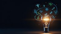 Glowing light bulb with floating medical healthcare icons and symbols representing innovation in medicine and digital health technology solutions.