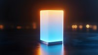 Glowing cube lamp with gradient color transition from warm orange to cool blue on dark background, creating atmospheric mood lighting effect.